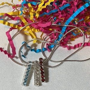 - Sterling Red-White-Blue Silver Necklace. Dangles are 7/8” long.